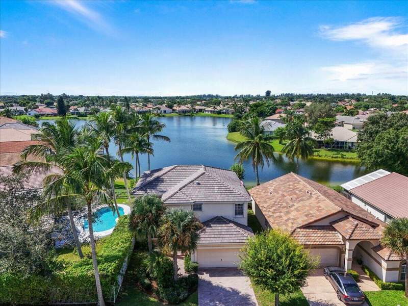 4 bedroom Single Family Residence at 7639 Northtree Club Drive, Hidden Lakes At Northtree, Greenacres — photo 2