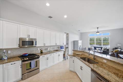 213 Magnolia Lakes Boulevard, Port St. Lucie FL - photo 8 of 49
