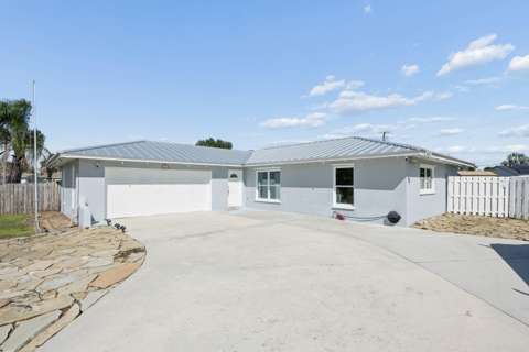 1101 SE Puritan Lane, home for sale in Port St. Lucie 34983