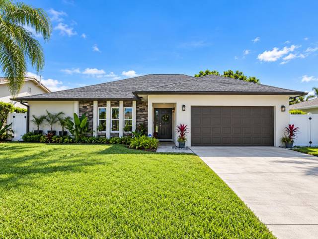 5052 Woodstone Circle, home for sale in Lake Worth