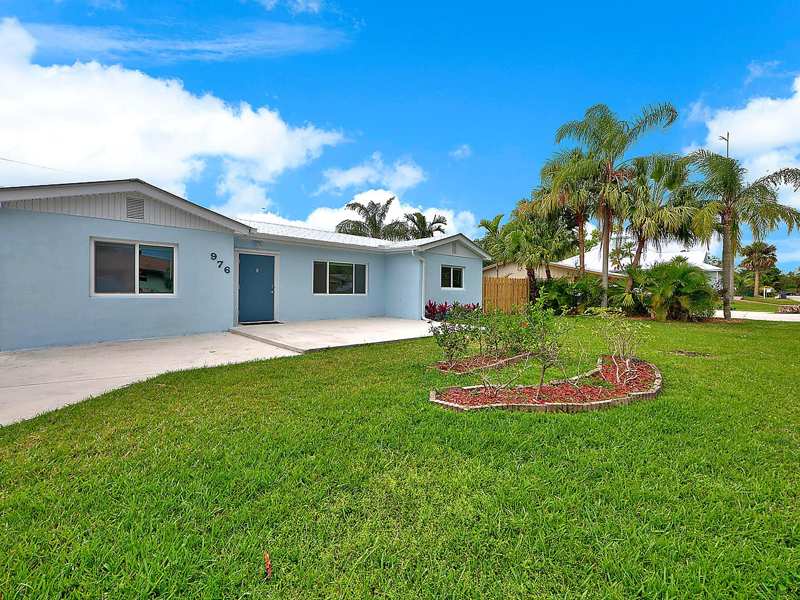 4 bedroom Single Family Residence at 976 SW 37th Street, Palm City Gardens, Palm City — photo 1