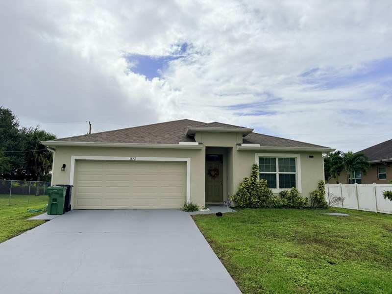 4 bedroom Single Family Residence at 1572 SW Escobar Lane, Port St Lucie Section 14, Port St. Lucie — photo 1