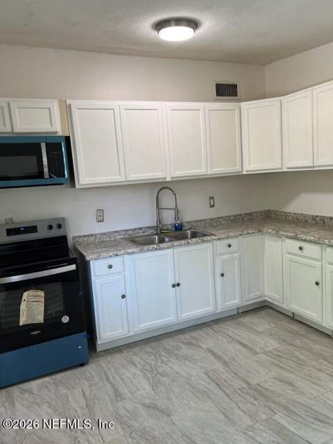 6831 Rhone Drive, Jacksonville FL - photo 12 of 37