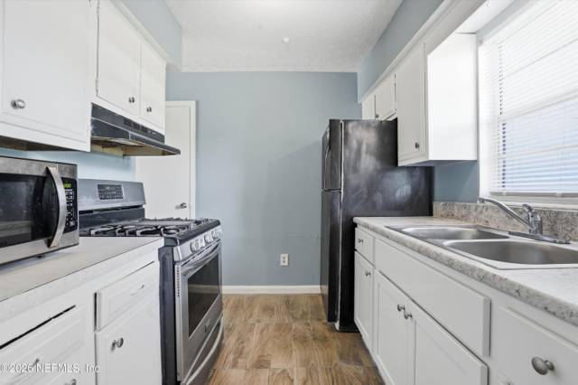 7428 WHITE ALDER DR Drive home for sale in Melvin Park