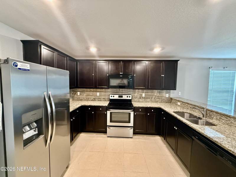 4 bedroom Single Family Residence at 8690 LAKE GEORGE Circle, Lakes At Woodlawn, Macclenny — photo 5