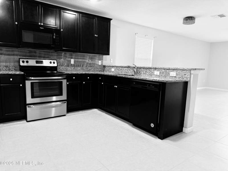 4 bedroom Single Family Residence at 8690 LAKE GEORGE Circle, Lakes At Woodlawn, Macclenny — photo 3