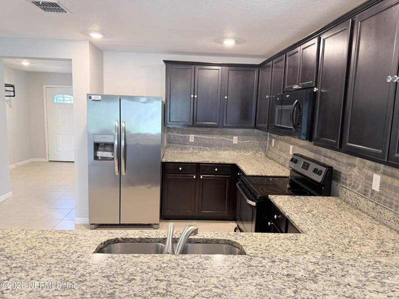 4 bedroom Single Family Residence at 8690 LAKE GEORGE Circle, Lakes At Woodlawn, Macclenny — photo 4