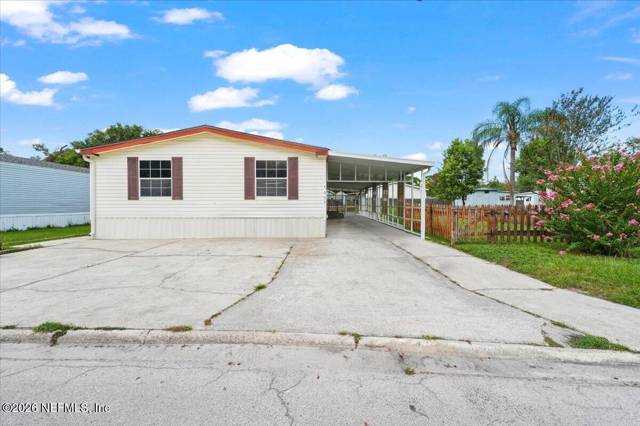 7605 SUNWOOD Drive