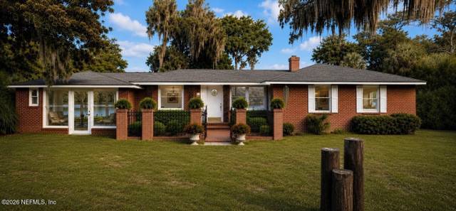 1900 E HOLLY OAKS LAKE Road home for sale in Holly Oaks
