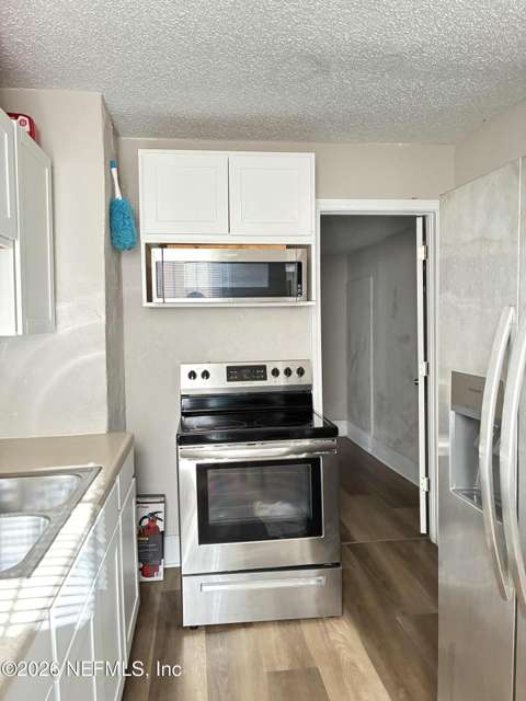 1138 E 13Th Street, home for sale on E 13Th Street