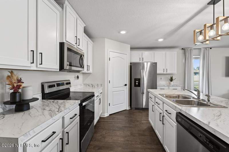 4 bedroom Single Family Residence at 70155 Roseapple Court, River Glen, Yulee — photo 5