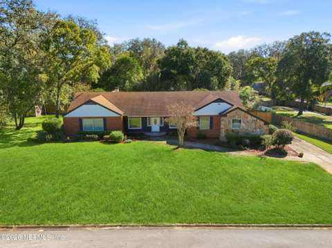 6311 Whispering Oaks Drive, home for sale in Jacksonville 32277