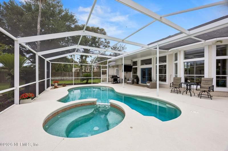 4 bedroom Single Family Residence at 12758 Muirfield Boulevard, Hidden Hills Cc, Jacksonville — photo 4
