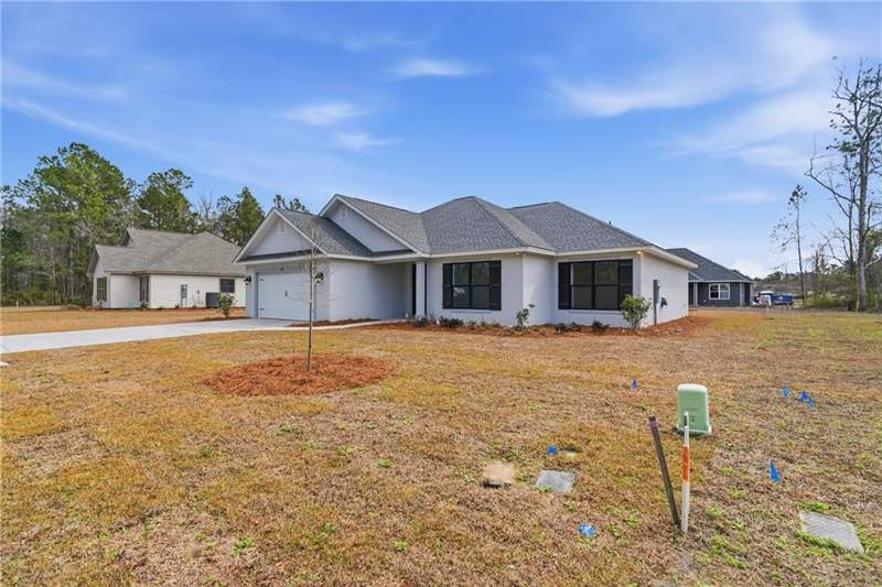 4 bedroom Single Family Residence at 405 Country Walk Circle, Country Walk, Brunswick — photo 3