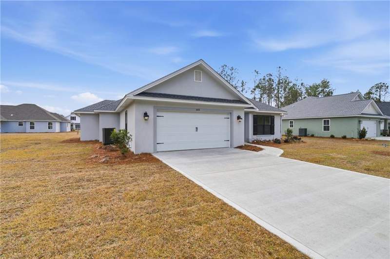 4 bedroom Single Family Residence at 405 Country Walk Circle, Country Walk, Brunswick — photo 2