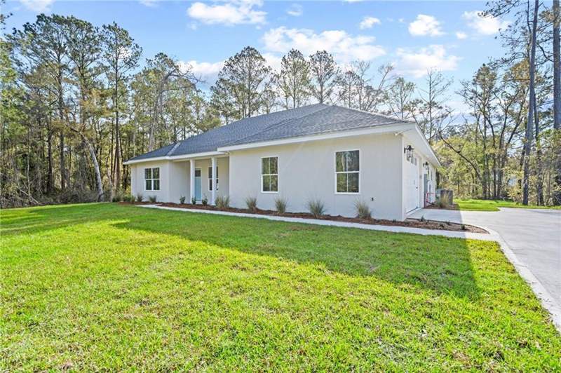 4 bedroom Single Family Residence at 1112 Blue Marlin Drive, The Cove at Shellman Bluff, Townsend — photo 2