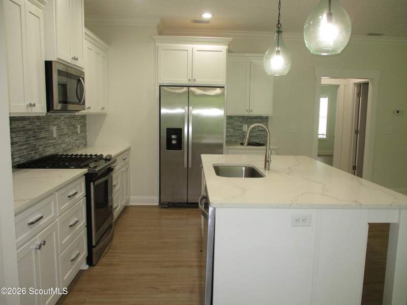 4 bedroom Single Family Residence at 1021 Captains Cv Way, Captain's Cove, St. Simons Island — photo 3