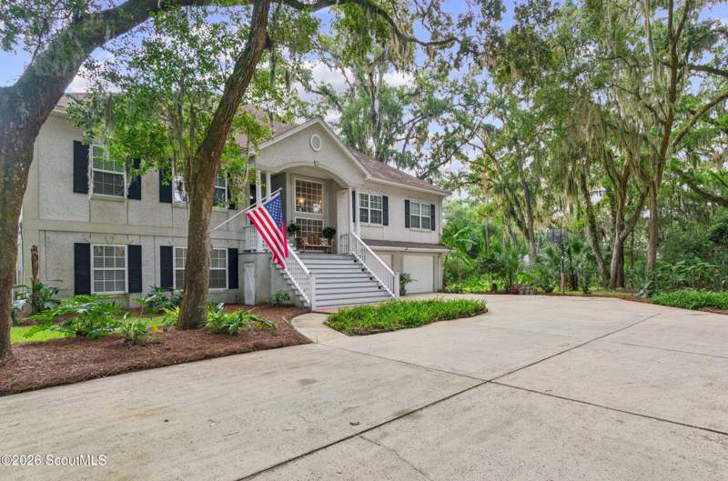 4 bedroom Single Family Residence at 412 Mimosa Drive, West Point Lake, St. Simons Island — photo 2