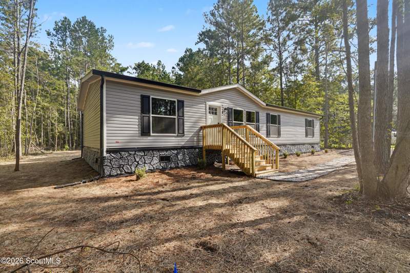 4 bedroom Manufactured Home at 1110 Lecounte Road, Eulonia Lake Estate, Townsend — photo 2