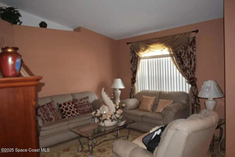 4 bedroom Single Family Residence at 999 Carver Road, Port Malabar Unit 10, Palm Bay — photo 2