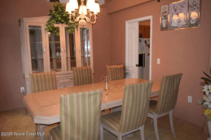 4 bedroom Single Family Residence at 999 Carver Road, Port Malabar Unit 10, Palm Bay — photo 4
