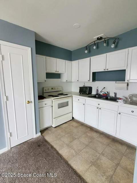 125 E Colonial Court #D, Indian Harbour Beach FL - photo 6 of 14