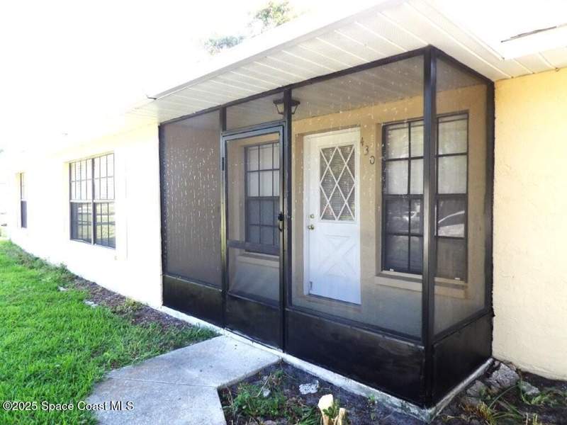 3 bedroom Single Family Residence at 430 Nogales Avenue, Port Malabar Unit 29, Palm Bay — photo 2