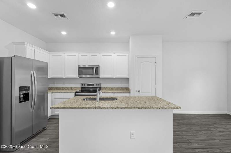 3 bedroom Single Family Residence at 1046 Barbados Avenue, Port Malabar Unit 12, Palm Bay — photo 3
