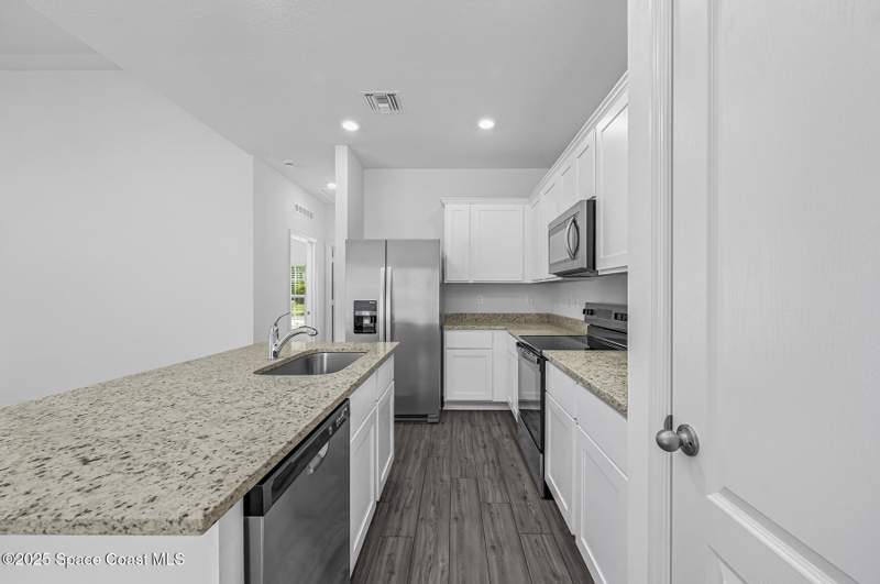 3 bedroom Single Family Residence at 1046 Barbados Avenue, Port Malabar Unit 12, Palm Bay — photo 4