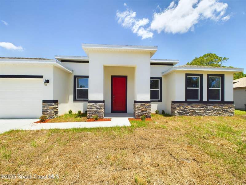 4 bedroom Single Family Residence at 692 Mistletoe Street, Port Malabar Unit 49, Palm Bay — photo 2
