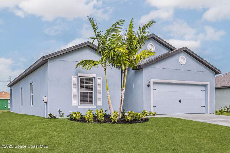 5 bedroom Single Family Residence at 418 Haleybury Street, Port Malabar Unit 31, Palm Bay — photo 2