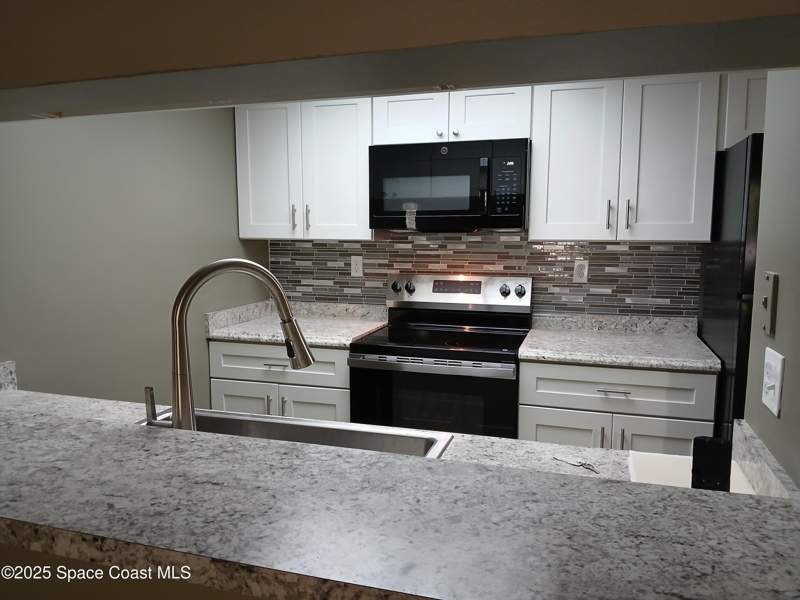 3 bedroom Condominium at 1617 Sunny Brook Lane #F103, Country Gardens I Condo, Palm Bay — photo 3