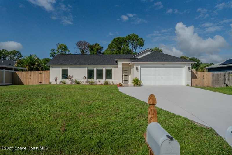 5 bedroom Single Family Residence at 490 Tillman Avenue, Port Malabar Unit 20, Palm Bay — photo 1