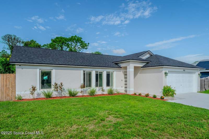 5 bedroom Single Family Residence at 490 Tillman Avenue, Port Malabar Unit 20, Palm Bay — photo 3