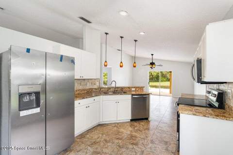 8426 Mizell Drive, Melbourne FL - photo 11 of 26