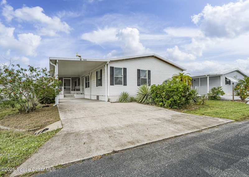 3 bedroom Manufactured Home at 7620 Boxelder Road, Snug Harbor Lakes Condo, Micco — photo 1