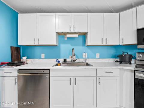 1040 Waterway Drive, Barefoot Bay FL - photo 9 of 32