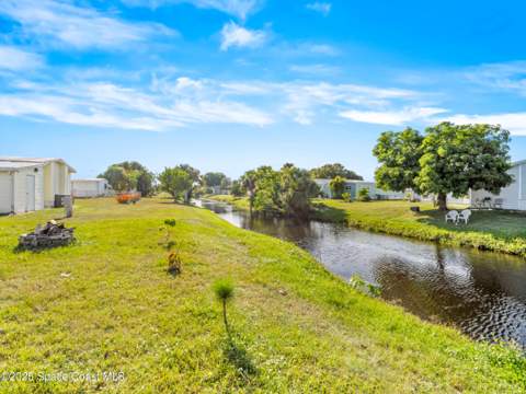 1040 Waterway Drive, Barefoot Bay FL - photo 24 of 32
