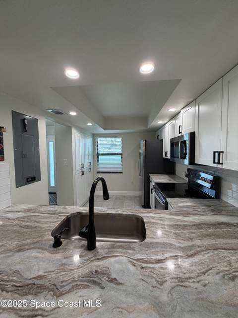 159 Kristi Drive, Indian Harbour Beach FL - photo 9 of 25