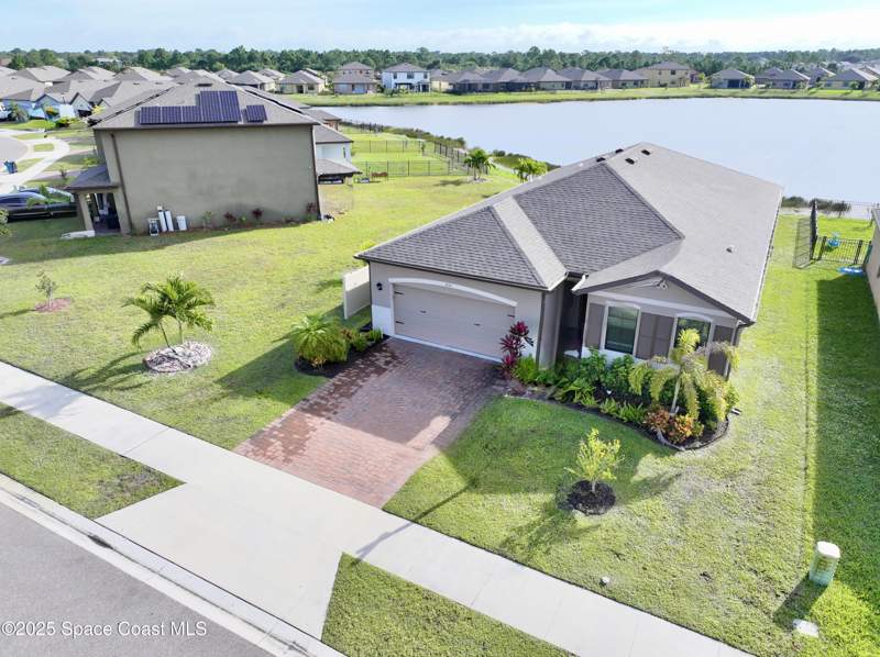 4 bedroom Single Family Residence at 830 Remington Green Drive, Preserves at Stonebriar Phase 2, Palm Bay — photo 3