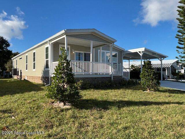 3 bedroom Manufactured Home at 723 Hyacinth Circle, Barefoot Bay Unit 2 Part 10, Barefoot Bay — photo 2
