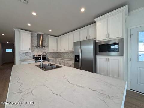 723 Hyacinth Circle, Barefoot Bay FL - photo 11 of 25