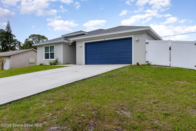 4 bedroom Single Family Residence at 866 Carnival Road Se Road, Port Malabar Unit 12, Palm Bay — photo 2