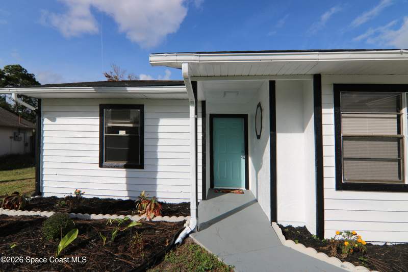 4 bedroom Single Family Residence at 711 Kempten Street, Port Malabar Unit 48, Palm Bay — photo 2