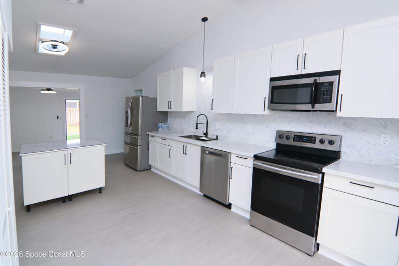 4 bedroom Single Family Residence at 711 Kempten Street, Port Malabar Unit 48, Palm Bay — photo 3