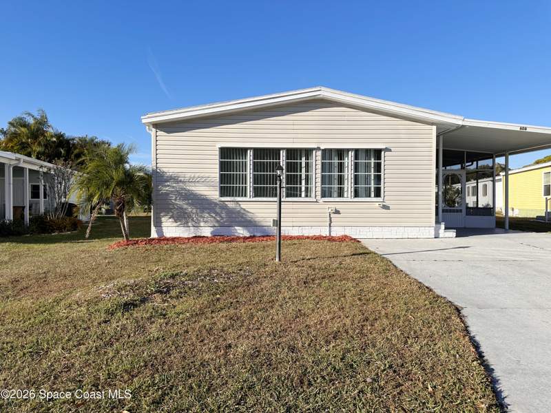 2 bedroom Manufactured Home at 606 Dolphin Circle, Barefoot Bay Unit 1, Barefoot Bay — photo 2
