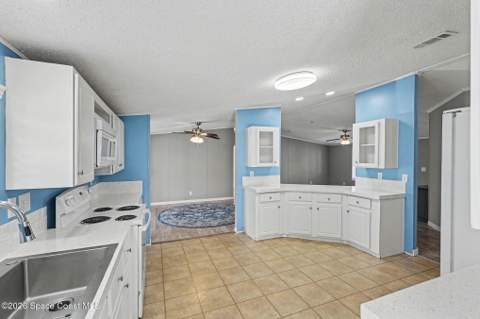 926 Laurel Circle, Barefoot Bay FL - photo 12 of 39
