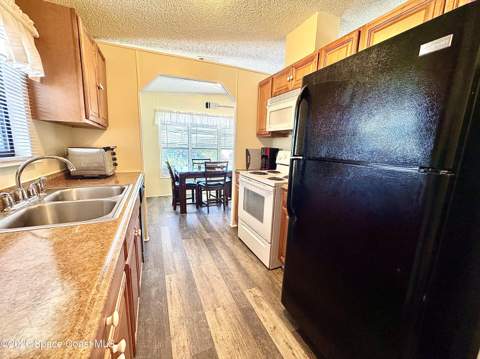482 Marlin Circle, Barefoot Bay FL - photo 10 of 39