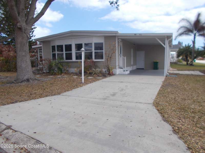 2 bedroom Manufactured Home at 932 Cashew Circle, Barefoot Bay Unit 2 Part 12, Barefoot Bay — photo 2