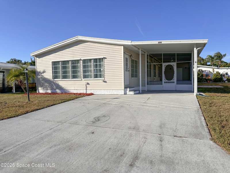2 bedroom Manufactured Home at 606 Dolphin Circle, Barefoot Bay Unit 1, Barefoot Bay — photo 1